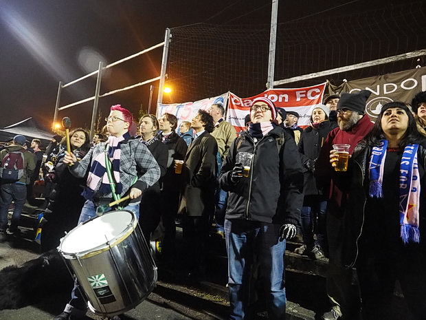 The carnival atmosphere behind the goal is clear to see. Photo credit Mike Urban.